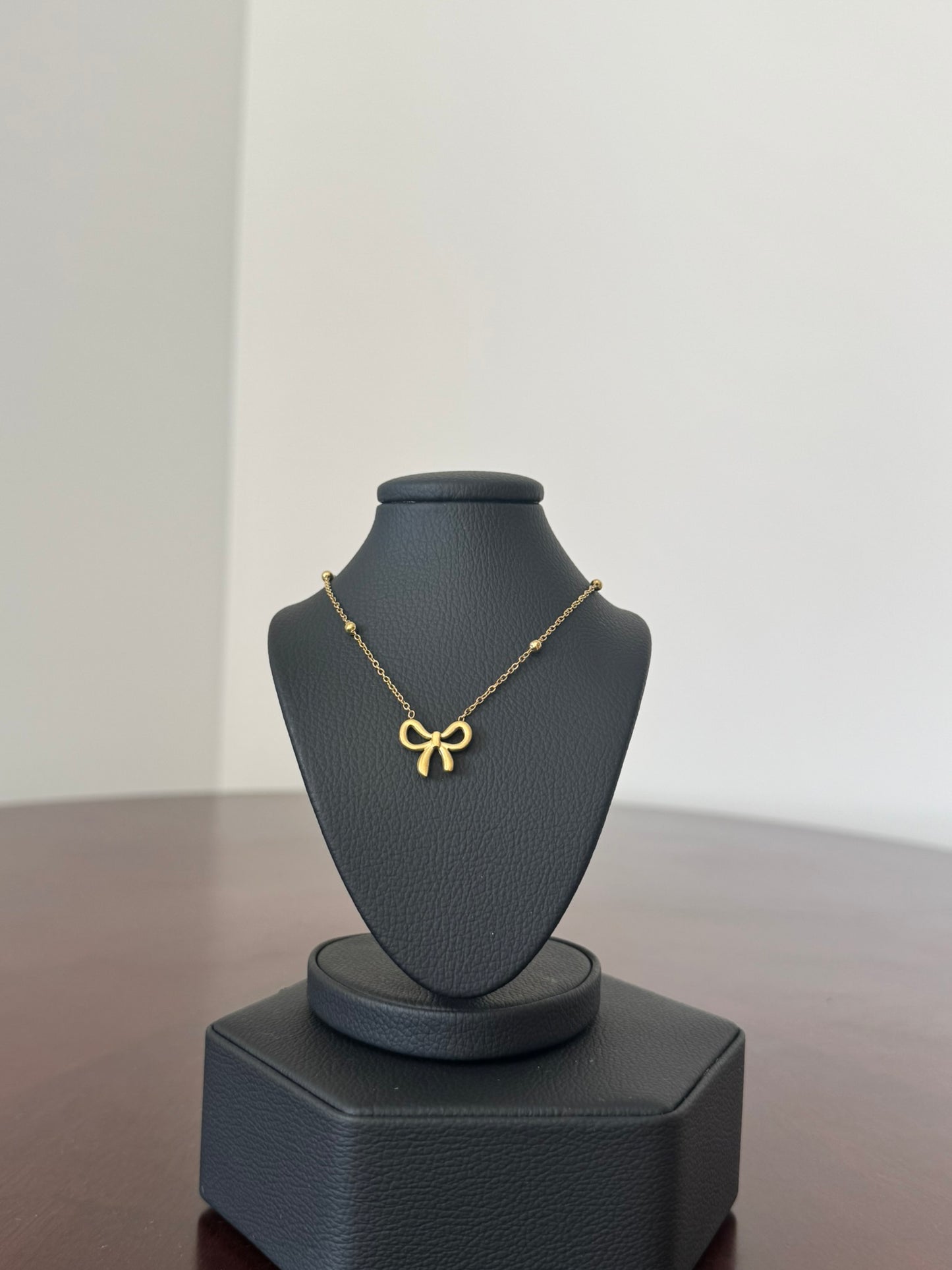 Collar Moño Dorado